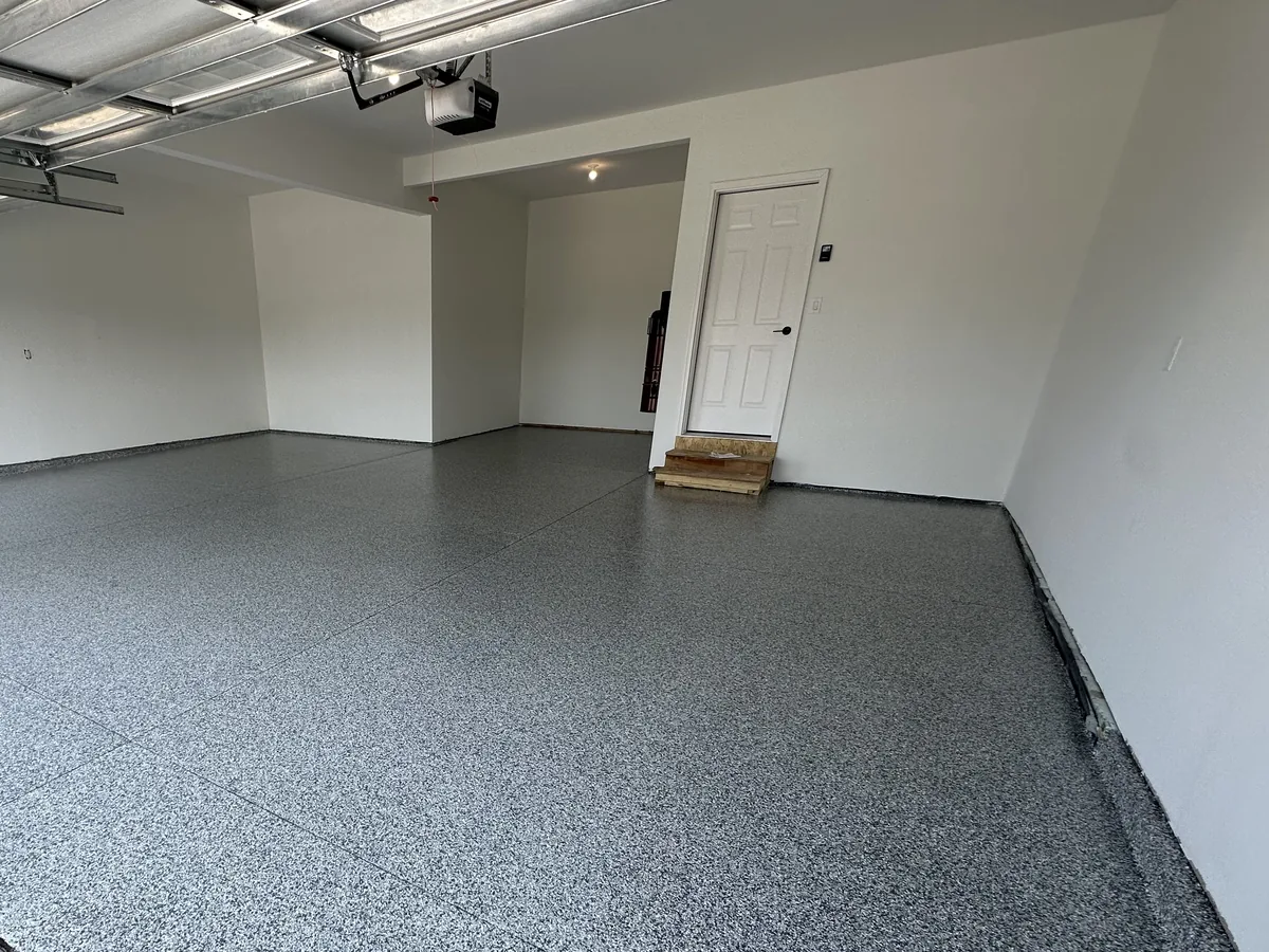 The same garage with a finished gray flake floor coating